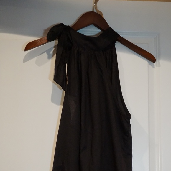 EARTHBOUND Tops - Earthbound sleeveless black blouse with side bow